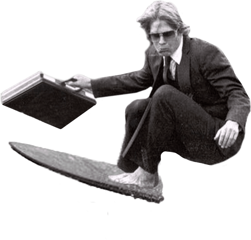 businessman on surfboard with briefcase